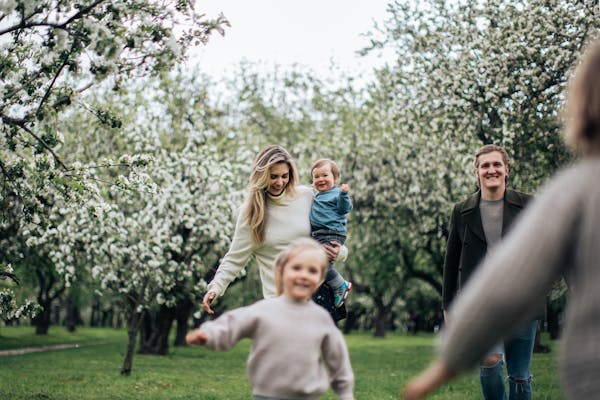 Happy family enjoying an active day together outdoors